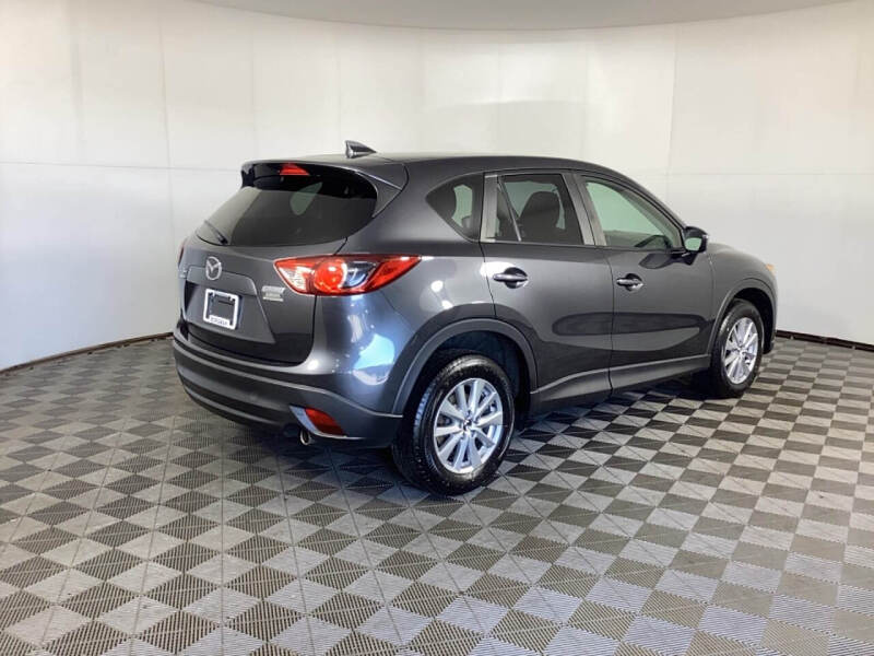 Used 2016 Mazda CX-5 Touring with VIN JM3KE4CY9G0867398 for sale in Grandville, MI