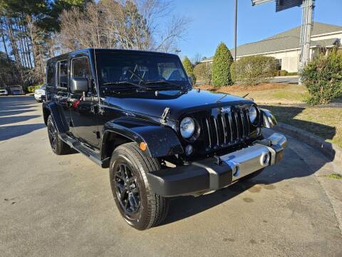 2014 Jeep Wrangler Unlimited for sale at Smithfield Auto Center LLC in Smithfield NC