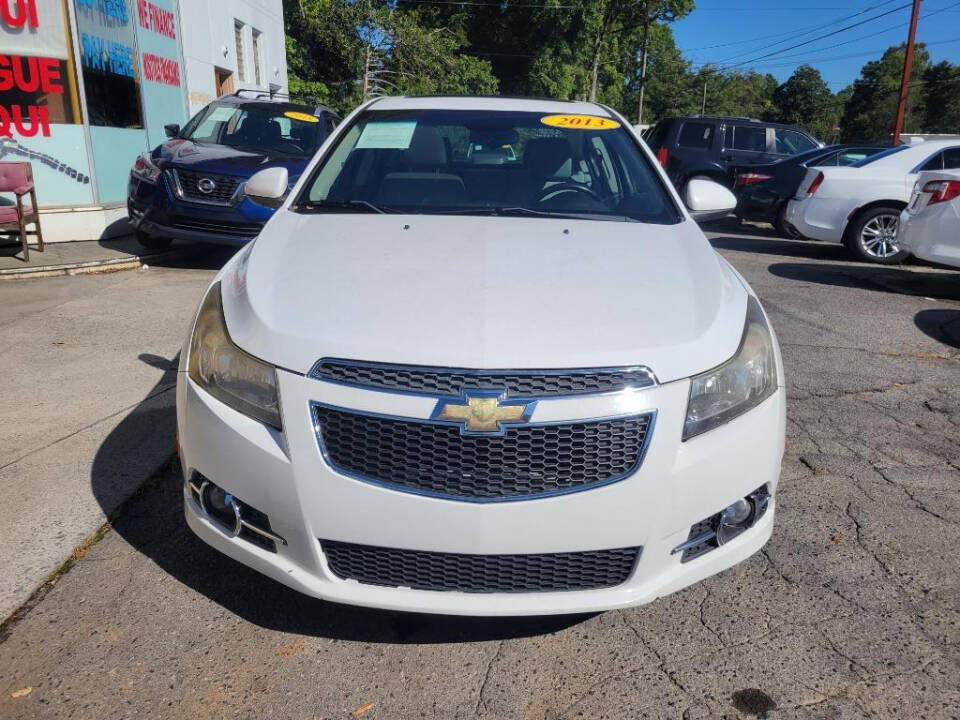 2013 Chevrolet Cruze for sale at DAGO'S AUTO SALES LLC in Dalton, GA