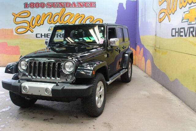 Used 2014 Jeep Wrangler Unlimited Sahara with VIN 1C4HJWEG8EL164045 for sale in Grand Ledge, MI