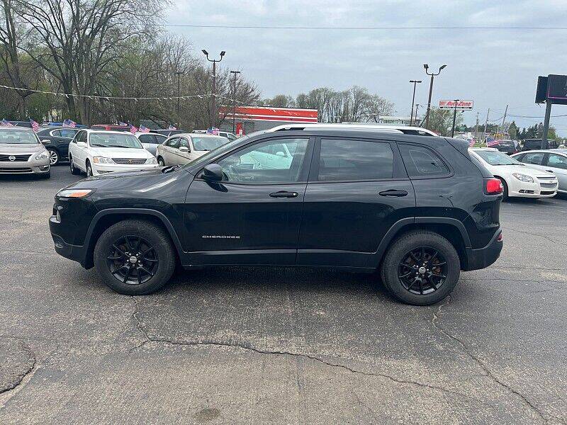 2014 Jeep Cherokee for sale at Car Zone in Otsego MI