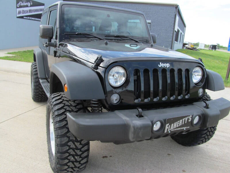 Used 2014 Jeep Wrangler Sport with VIN 1C4AJWAG8EL240161 for sale in Albert Lea, Minnesota