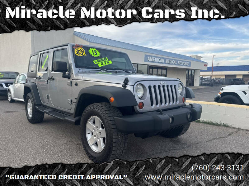 2013 Jeep Wrangler Unlimited for sale at Miracle Motor Cars Inc. in Victorville CA