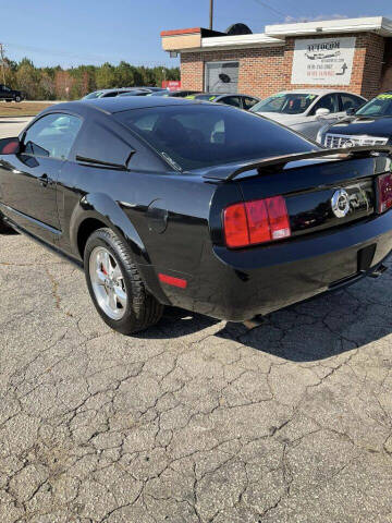 2005 Ford Mustang for sale at Autocom, LLC in Clayton NC