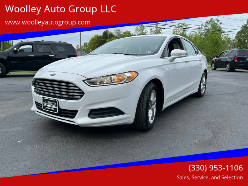 2014 Ford Fusion for sale at Woolley Auto Group LLC in Poland OH