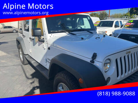 2015 Jeep Wrangler Unlimited for sale at Alpine Motors in Van Nuys CA