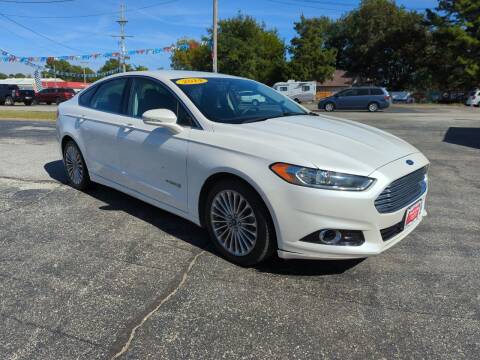 2014 Ford Fusion Hybrid for sale at Towell & Sons Auto Sales in Manila AR