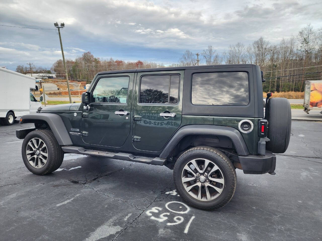 2011 Jeep Wrangler Unlimited for sale at Performance Auto Sales in Hickory, NC