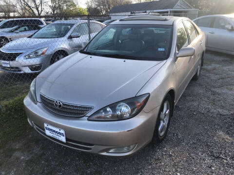 2002 Toyota Camry for sale at Simmons Auto Sales in Denison TX