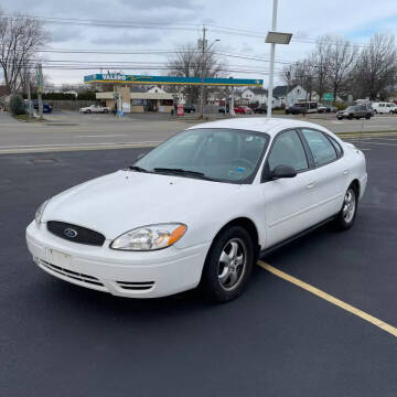 2006 Ford Taurus for sale at American & Import Automotive in Cheektowaga NY