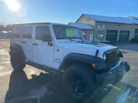 2018 Jeep Wrangler JK Unlimited for sale at Greg's Auto Sales in Searsport ME