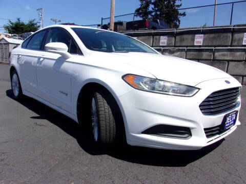 2013 Ford Fusion Hybrid for sale at Delta Auto Sales in Milwaukie OR