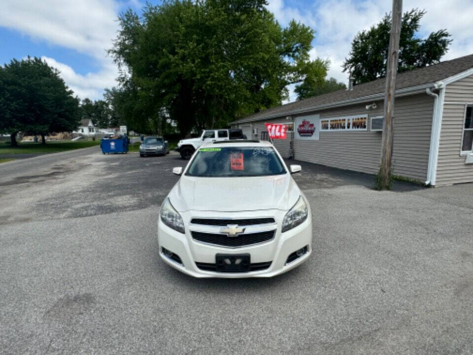 2013 Chevrolet Malibu for sale at Mitrione Motors in Springfield, IL