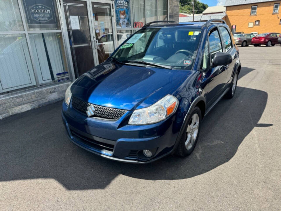 2011 Suzuki SX4 Crossover for sale at B N M Auto Sales Inc in New Castle, PA