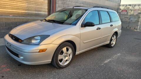 2004 Ford Focus for sale at Autos Under 5000 + JR Transporting in Island Park NY