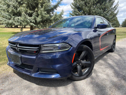 2015 Dodge Charger for sale at BELOW BOOK AUTO SALES in Idaho Falls ID