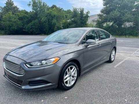 2014 Ford Fusion for sale at Asap Motors Inc in Fort Walton Beach FL