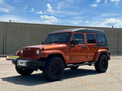 2011 Jeep Wrangler Unlimited for sale at EA Motorgroup in Austin TX