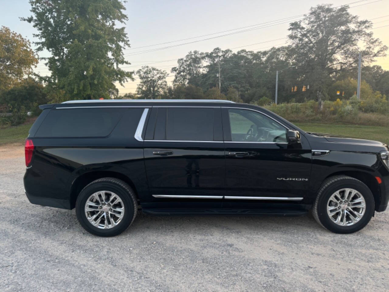 2021 GMC Yukon XL for sale at Guadalupe Auto Sales, LLC. in Jemison, AL