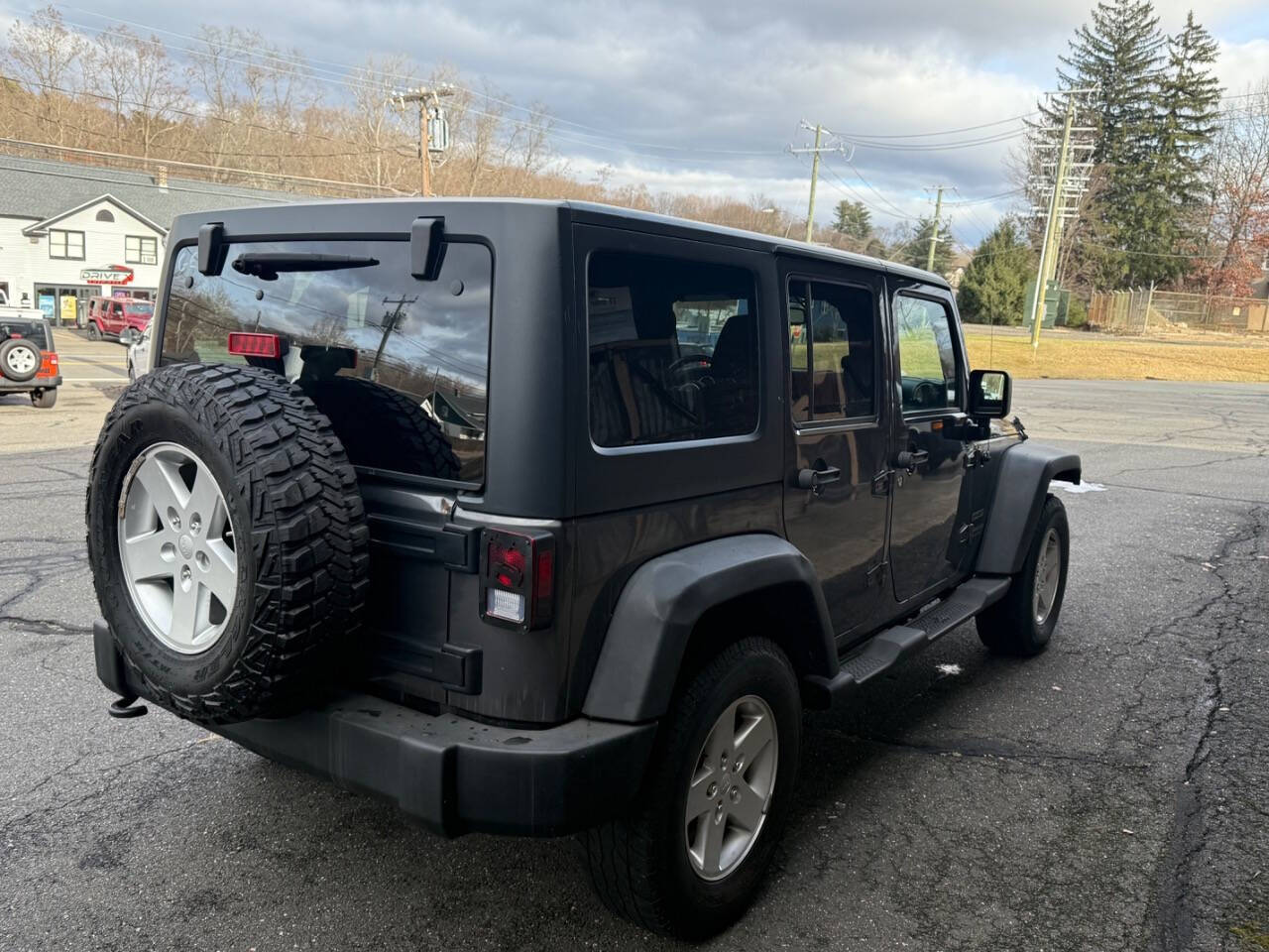 2017 Jeep Wrangler Unlimited for sale at Drive X in Oakville, CT