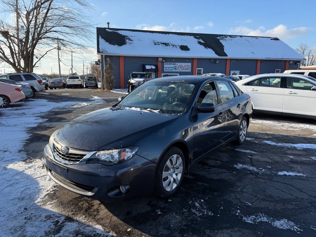 2009 Subaru Impreza for sale at AVS AUTO GROUP LLC in CLEVELAND, OH