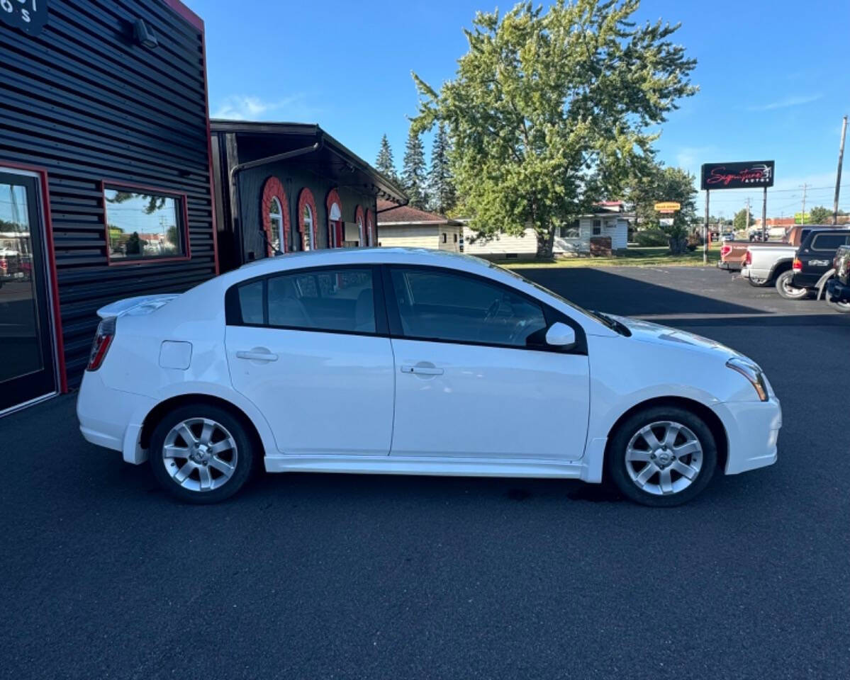 2012 Nissan Sentra for sale at SIGNATURE AUTOS LLC in Weston, WI