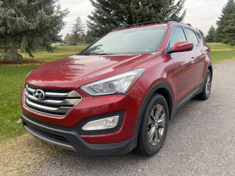2014 Hyundai Santa Fe Sport for sale at BELOW BOOK AUTO SALES in Idaho Falls ID