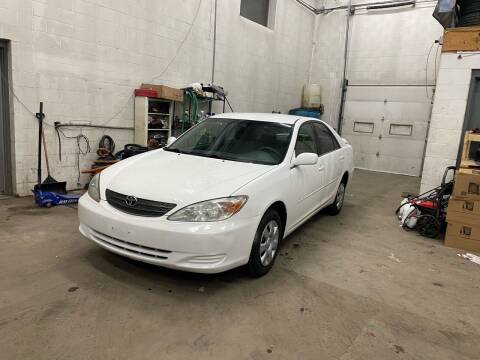 2003 Toyota Camry for sale at United Motors in Saint Cloud MN