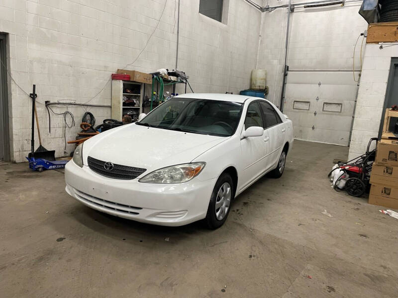 2003 Toyota Camry for sale at United Motors in Saint Cloud MN