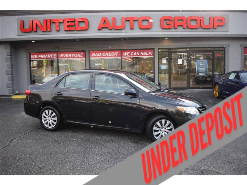 2013 Toyota Corolla for sale at United Auto Group in Putnam CT