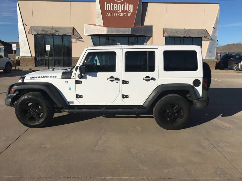 2016 Jeep Wrangler Unlimited for sale at Integrity Auto Group in Wichita KS