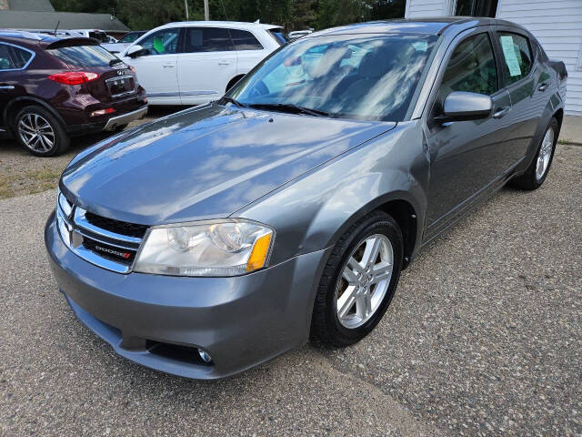 2013 Dodge Avenger for sale at DANGO AUTO SALES in HOWARD CITY, MI