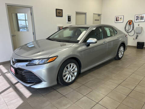 2020 Toyota Camry for sale at DAN PORTER MOTORS in Dickinson ND