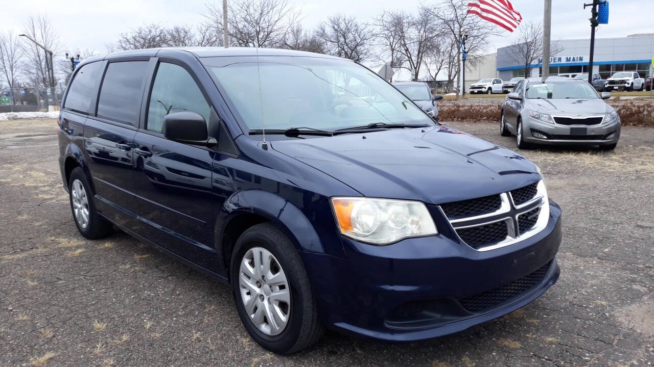 2014 Dodge Grand Caravan for sale at CHRISTIAN AUTO SALES in Anoka, MN