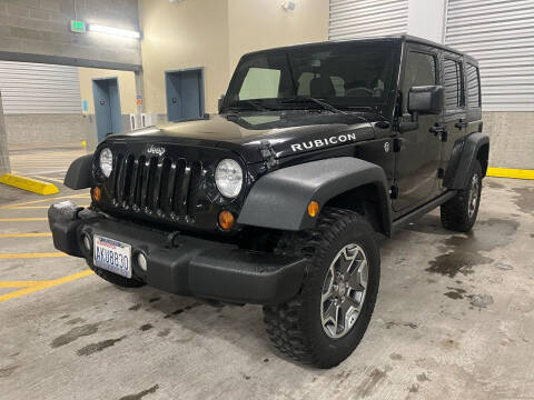 2013 Jeep Wrangler Unlimited for sale at Wild West Cars & Trucks in Seattle WA