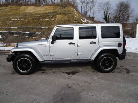 2012 Jeep Wrangler Unlimited for sale at LYNDORA AUTO SALES in Lyndora PA