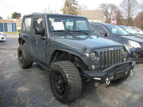 2016 Jeep Wrangler for sale at USED CAR FACTORY in Janesville WI