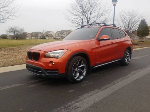 2013 BMW X1 for sale at CALDERONE CAR & TRUCK in Whiteland IN
