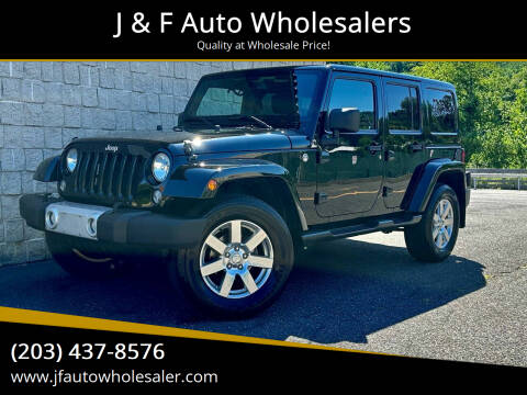 2014 Jeep Wrangler Unlimited for sale at J & F Auto Wholesalers in Waterbury CT