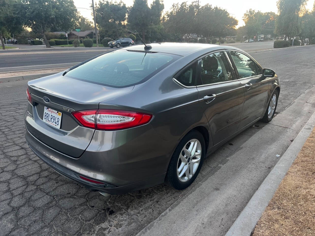 2014 Ford Fusion for sale at AUTO 4 LESS in Fresno, CA