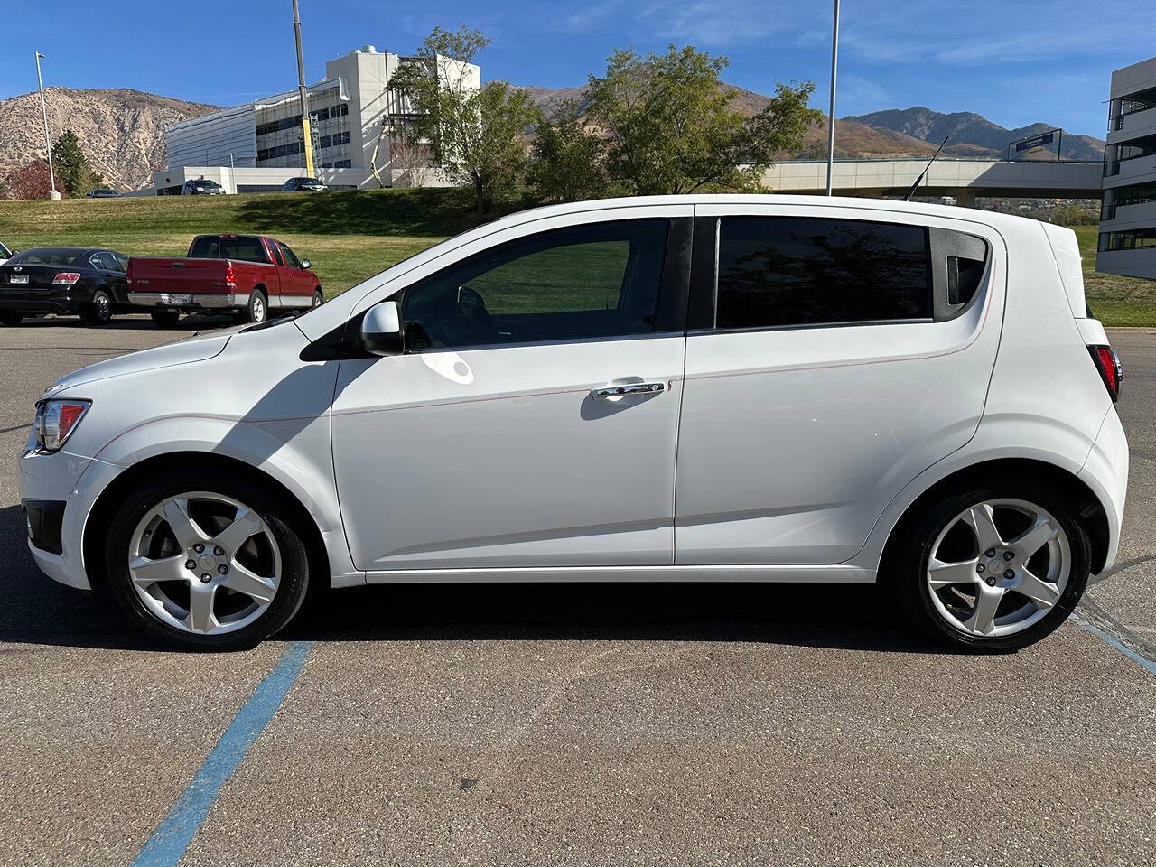 2014 Chevrolet Sonic for sale at DRIVE N BUY AUTO SALES in OGDEN, UT