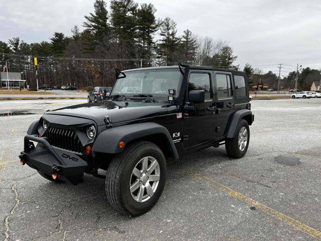 2009 Jeep Wrangler Unlimited for sale at J & E AUTOMALL in Pelham NH