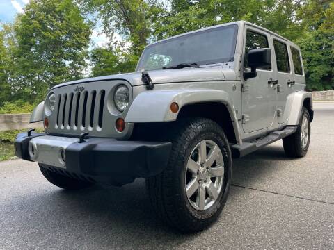 2011 Jeep Wrangler Unlimited for sale at The Car Lot Inc in Cranston RI