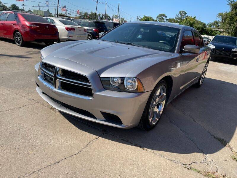2013 Dodge Charger for sale at Sam's Auto Sales in Houston TX