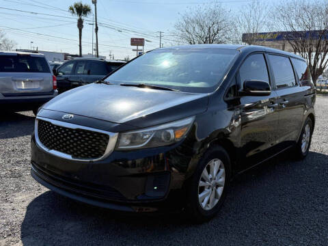 2017 Kia Sedona for sale at Lamar Auto Sales in North Charleston SC