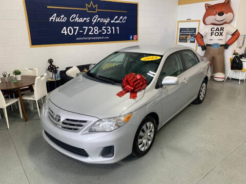 2013 Toyota Corolla for sale at Auto Chars Group LLC in Orlando FL