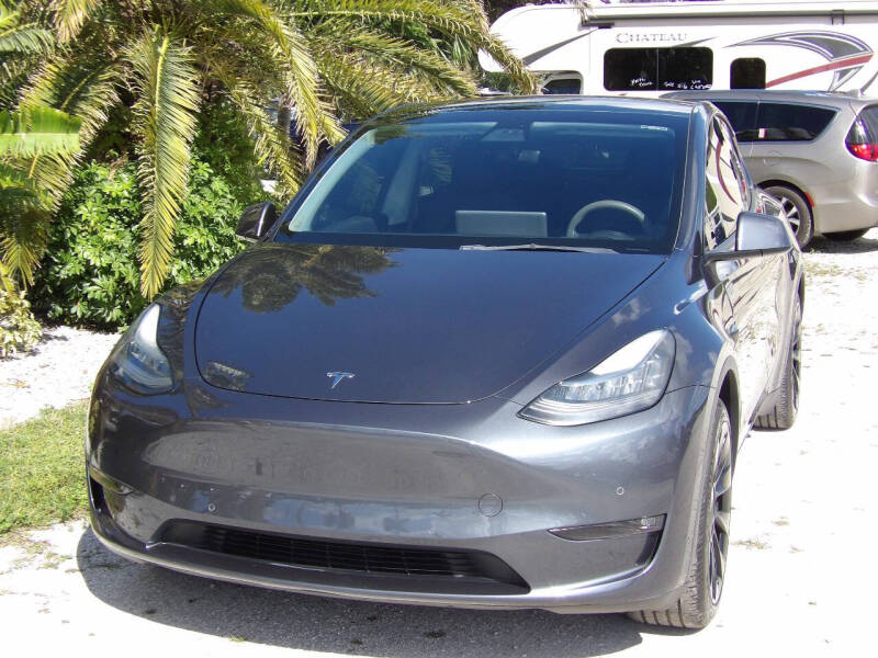 Used 2021 Tesla Model Y Standard Range with VIN 5YJYGDED1MF177021 for sale in Fort Myers, FL