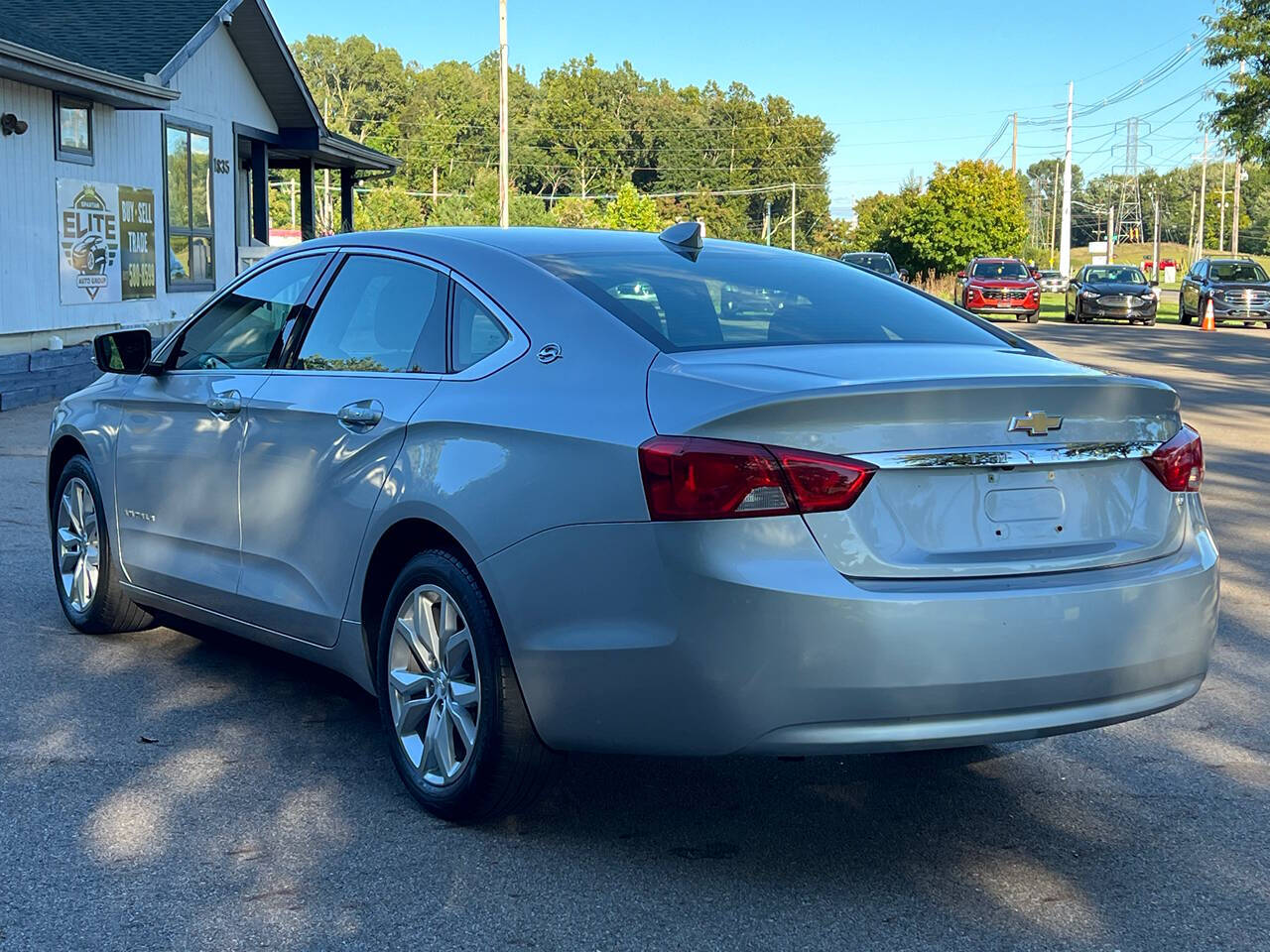 2019 Chevrolet Impala for sale at Spartan Elite Auto Group LLC in Lansing, MI