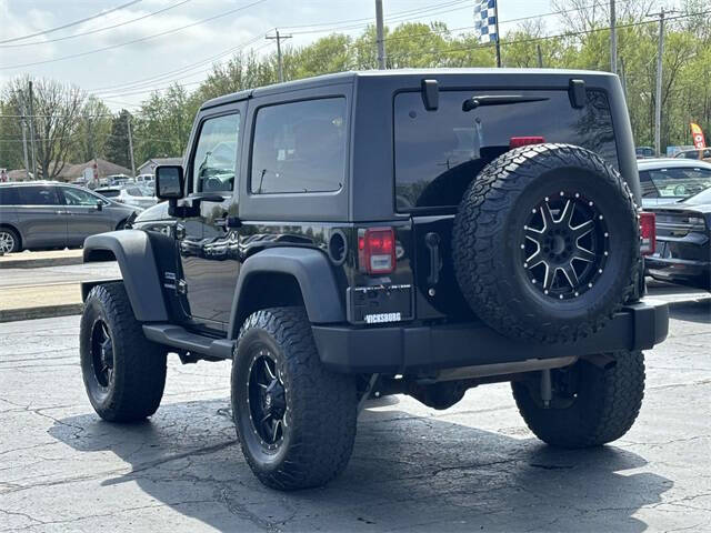 Used 2011 Jeep Wrangler Sport with VIN 1J4AA2D12BL587569 for sale in Vicksburg, MI