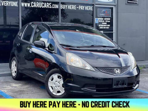 2013 Honda Fit for sale at CARUCARS LLC in Miami FL